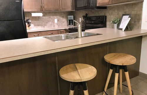 South Pandosy Condo | Beautiful 2nd Floor Condo on Quiet Creekside