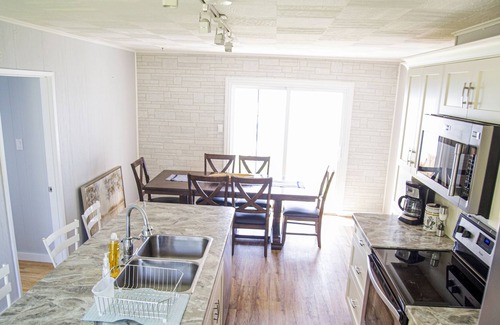Bridgenorth House | Beautiful 3 bedroom cottage on Chemong Lake with 100 ft of sandy waterfront.