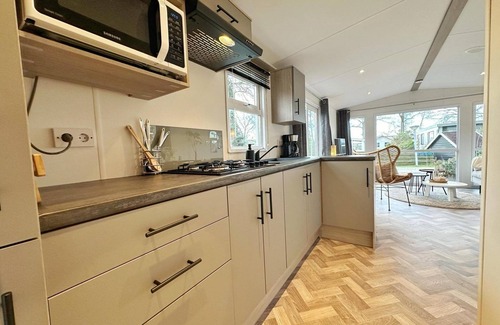 Sint Maarten House | Beautiful chalet with a lovely enclosed garden and BBQ to relax in after a day at the beach with your dog.