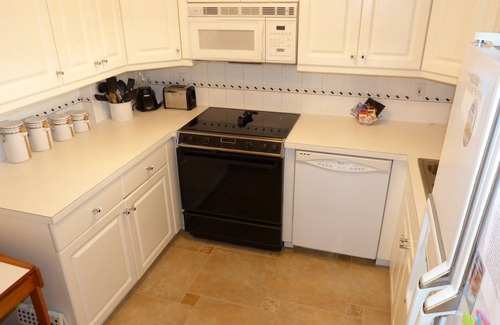 Redington Beach Condo | Beautiful Condo on Miles of White Sand Beach. Watch Dolphins from your bedroom!