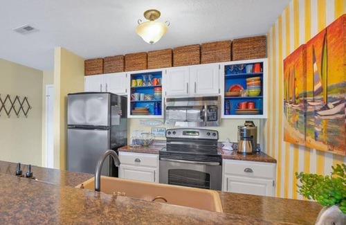 Lake of the Ozarks Condo | Beautiful condo with spectacular water view overlooking lakeside pool and deck.