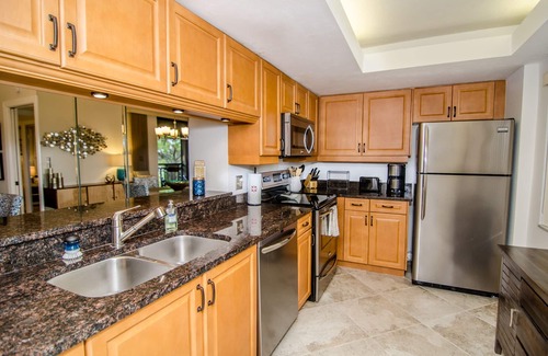 Bonita Bay Condo | Beautiful Corner Unit, great views from private lanai & access to Private Beach