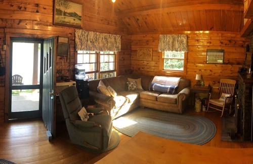 Dedham Cabin | Beautiful cozy Maine log cabin on the water.