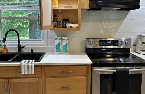 Poughkeepsie House | Beautiful creekside secluded cottage with canoeing on site. Pet friendly.