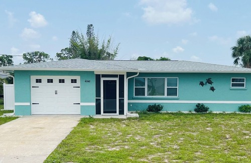 Grove City House | Beautiful Englewood beach home with boatslip