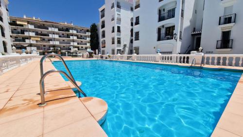 San Luis de Sabinillas Apartment | Beautiful Beachfront Newly Renovated 2 Bedroom Apartment with Swimming Pool and Garden