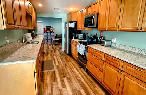 Sand Creek House | Beautiful Evans Lakefront Getaway: Private Beach, Sleeps 10!