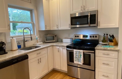 Hampton Bays House | Beautiful expanded ranch with two master bedrooms and en suite full baths