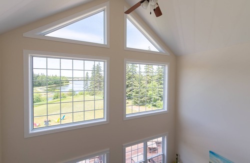 Stanley Bridge House | Beautiful four bedroom home with waterview, outdoor hot tub, and fire pit