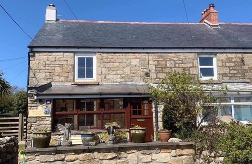 Saint Erth Praze House | Beautiful granite cottage with parking and garden. Near the coast. Dogs welcome.