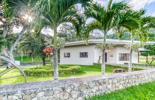 Santa Eulalia House | Beautiful ground-level house with furnished terrace, gardens, and shared pool!