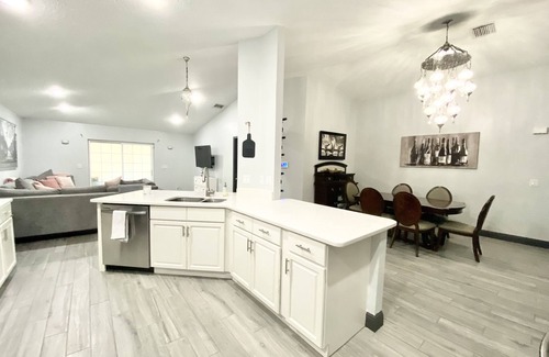 Titusville House | Beautiful heated pool home with office in Florida
