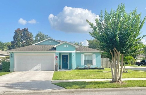 Titusville House | Beautiful heated pool home with office in Florida