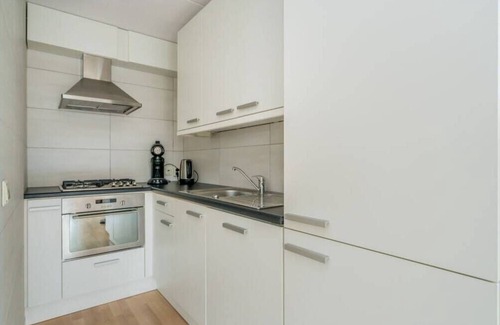 Oude-Tonge House | Beautiful holiday home with various extras such as an extended bedroom on the ground floor, veranda