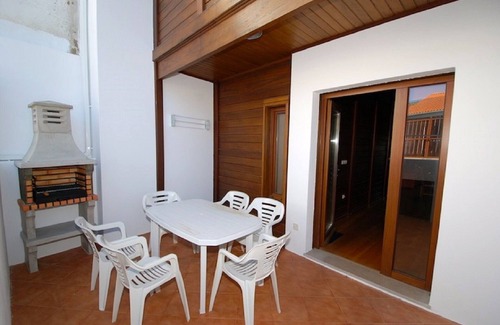 Casais do Rio House | Beautiful holiday house with wood interiors, close to the beach and golf courses