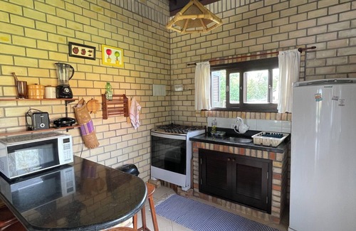Praia do Rosa House | Beautiful home in Rosa Beach overlooking the Lagoon