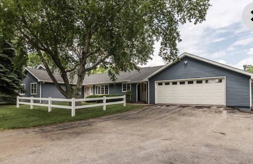 Iowa City House | Beautiful home nestled on almost 2 acres in the city.
