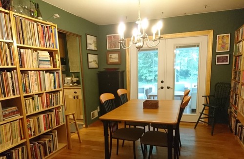 Colesville House | Beautiful home with shady front porch and rear sunroom in tree lined backyard.