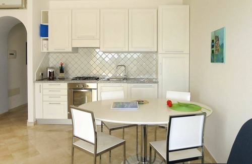 Porto Pozzo Apartment | Beautiful apartment for 4 guests with pool, WIFI, A/C, TV, terrace, pets allowed and parking