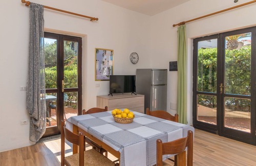 Capo Testa Apartment | Beautiful apartment for 4 guests with A/C, TV, terrace and pets allowed