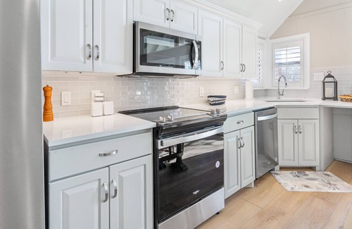 Tool House | Beautiful lakefront views, boat slip, fire pit, grill gazebo, huge family deck