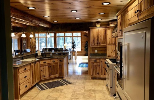 Dundee Cabin | Beautiful Log Cabin nestled in the woods of Amish Country. Relax in our hot tub!