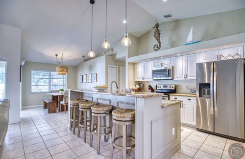 Englewood East House | Beautiful Open Concept Pool House With Lanai and Private Fenced In Yard