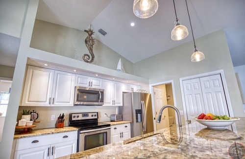 Englewood East House | Beautiful Open Concept Pool House With Lanai and Private Fenced In Yard