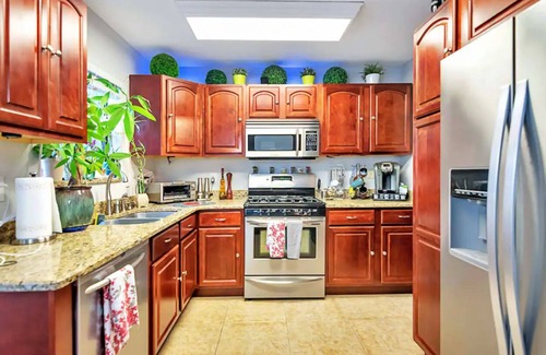 Tropic House | Beautiful Pool Home & SPA -w/Private Movie Theater!Your Home Away from Home