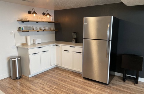 Millcreek House | Beautiful Remodeled Mid-Century Two Level Home