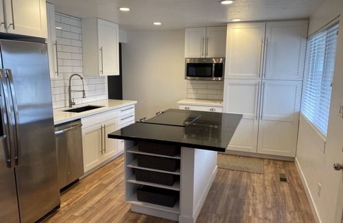 Millcreek House | Beautiful Remodeled Mid-Century Two Level Home