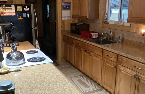 Kalkaska House | Beautiful Sunsets Over the all sport's, quiet Crawford Lake. Year round rental!