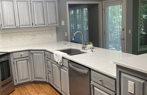 Hot Springs Village House | Beautiful townhome with large, sunny atrium and back deck. Sleepsn6.