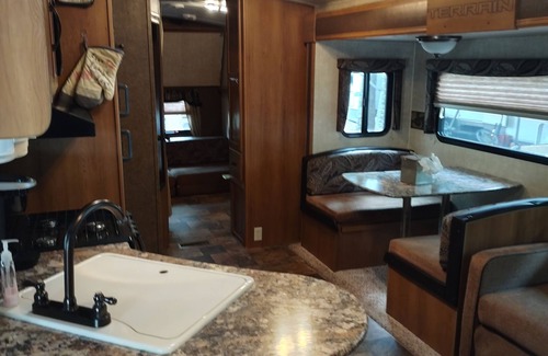 Dade City House | Beautiful travel trailer with private fenced in yard, deck, and fire pit.