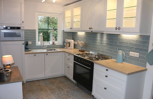 Julianadorp aan zee House | Beautiful vacation home close to the beach, fireplace, quiet location, completely fenced in