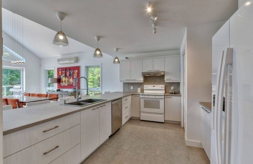 Mille-Isles Ski Chalet | Beautiful waterfront cottage on a pristine lake in Morin Heights