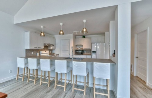 Mille-Isles Ski Chalet | Beautiful waterfront cottage on a pristine lake in Morin Heights