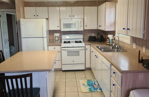 Hope Town Villa | Beautiful waterfront home w/private dockage within HT Harbour