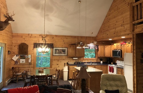 Elmira Cottage | Beautiful wooded setting in Lakes of the North!