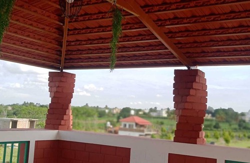 Chikkaballapur Villa | Beautifully designed Earthern home situated at the base of Skandagiri hills.
