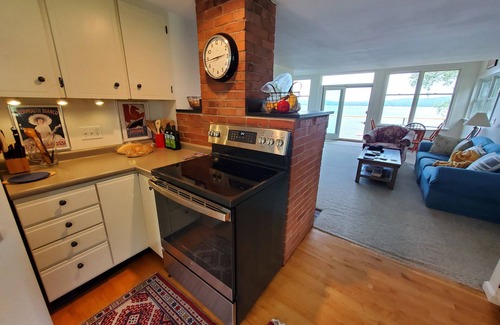Raymond House | Beautifully landscaped home on Panther Pond just 20 feet from the shore!