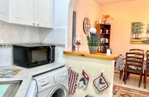Universal Apartment | Beautifully presented 2 bedrooms apartment with a pool and garden view.