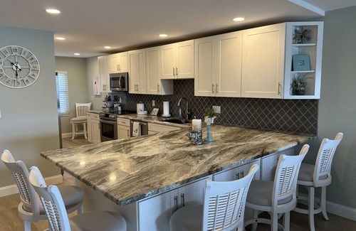 Capri Isle Condo | Beautifully renovated waterfront owner's unit, BOAT LIFT AVAILABLE for add fee