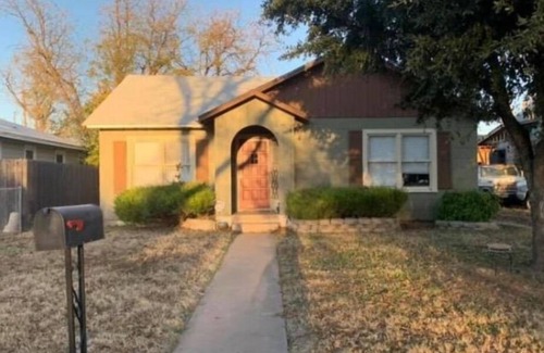 San Angelo House | Bedroom for rent. Shared common spaces.