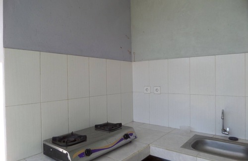 Bangli Bed & Breakfast | Bedroom of 5 pax Gold Kintamani