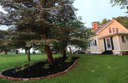 Lancaster House | Bedroom with a King Bed in the Guest House - Lancaster, KY