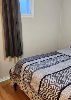 Mississauga House | Bedroom with double bed