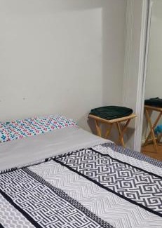Mississauga House | Bedroom with double bed