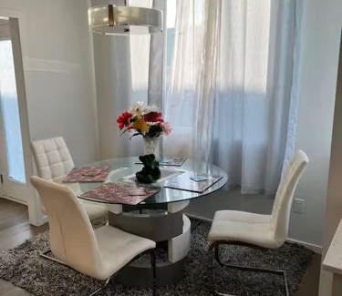 Southwest Edmonton House | Bedroom with private bathroom in Southwest