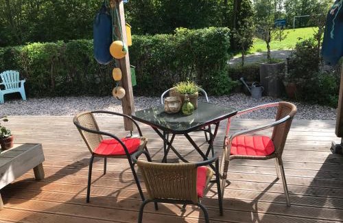 Anjum House | BelleMare Bungalow Lauwersmeer mit überdachte Veranda und eingezäuntem Garten
